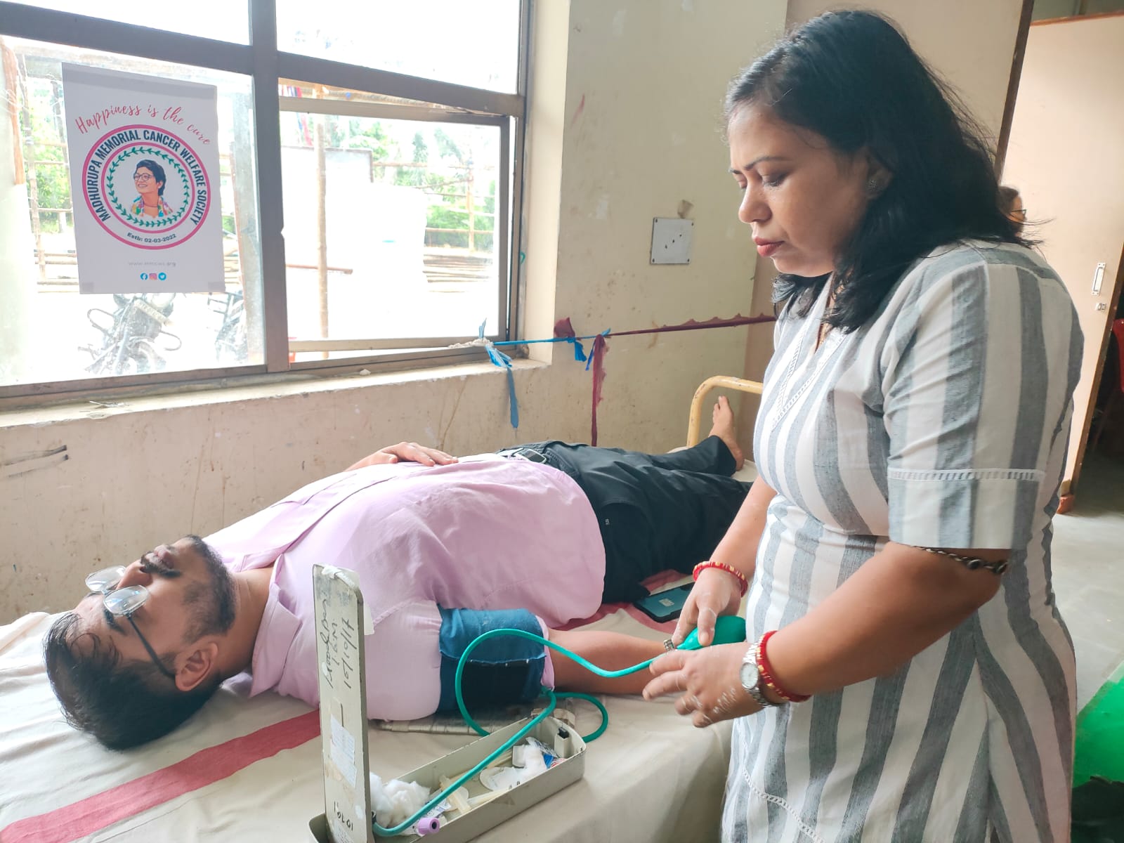 Walking lens (Photography exhibition with help of Streets of Tripura) and Blood donation Camp for Cancer patients - Organized by MMCWS.